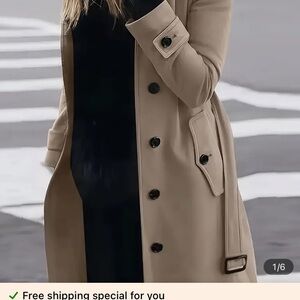 Vintage belted, khaki trench coat with black buttons.